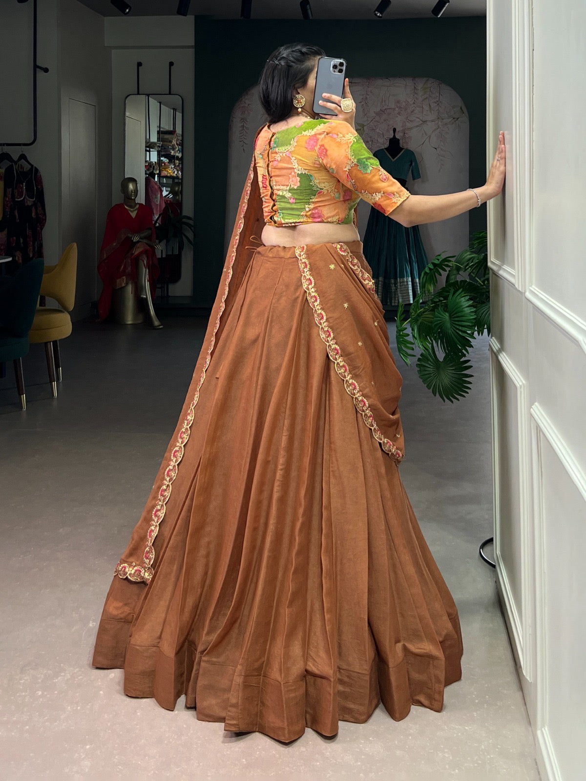 Combining traditional embroidery with the richness of chocolate crush fabric Lehenga choli