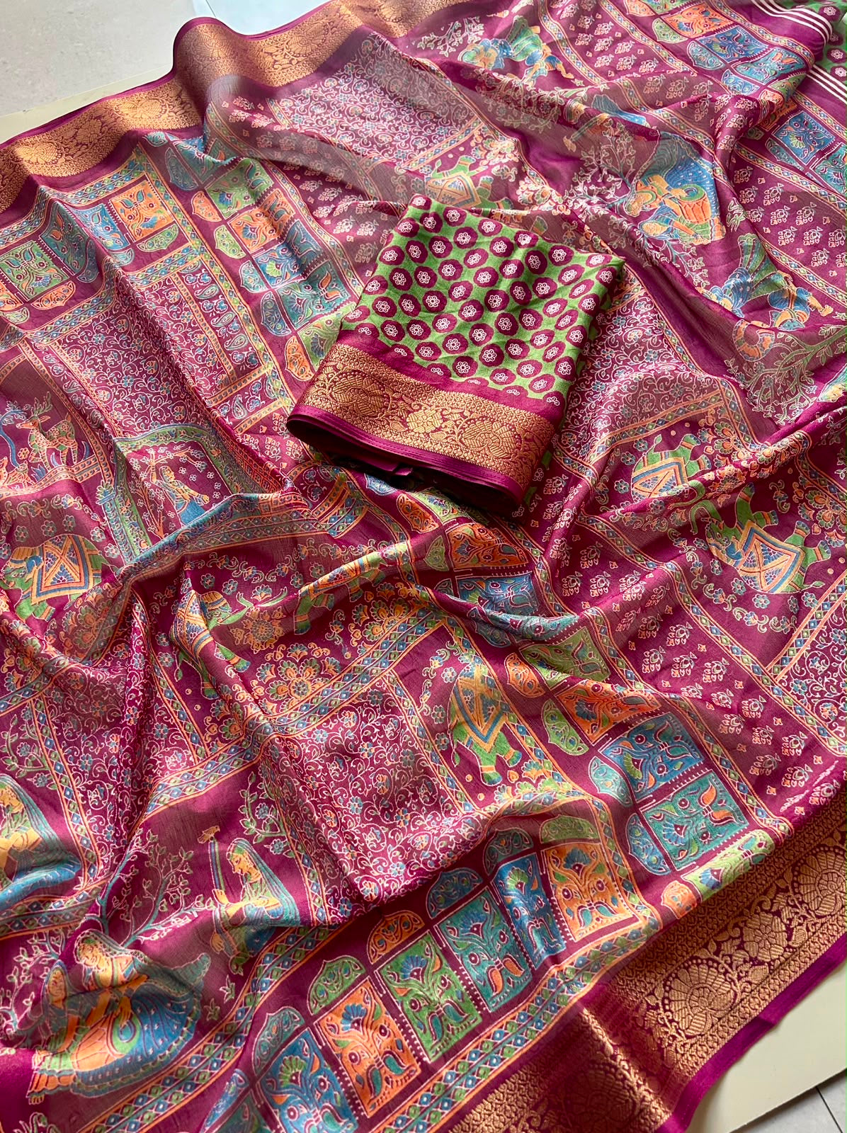 Dola silk saree with Kalamkari print and jacquard border