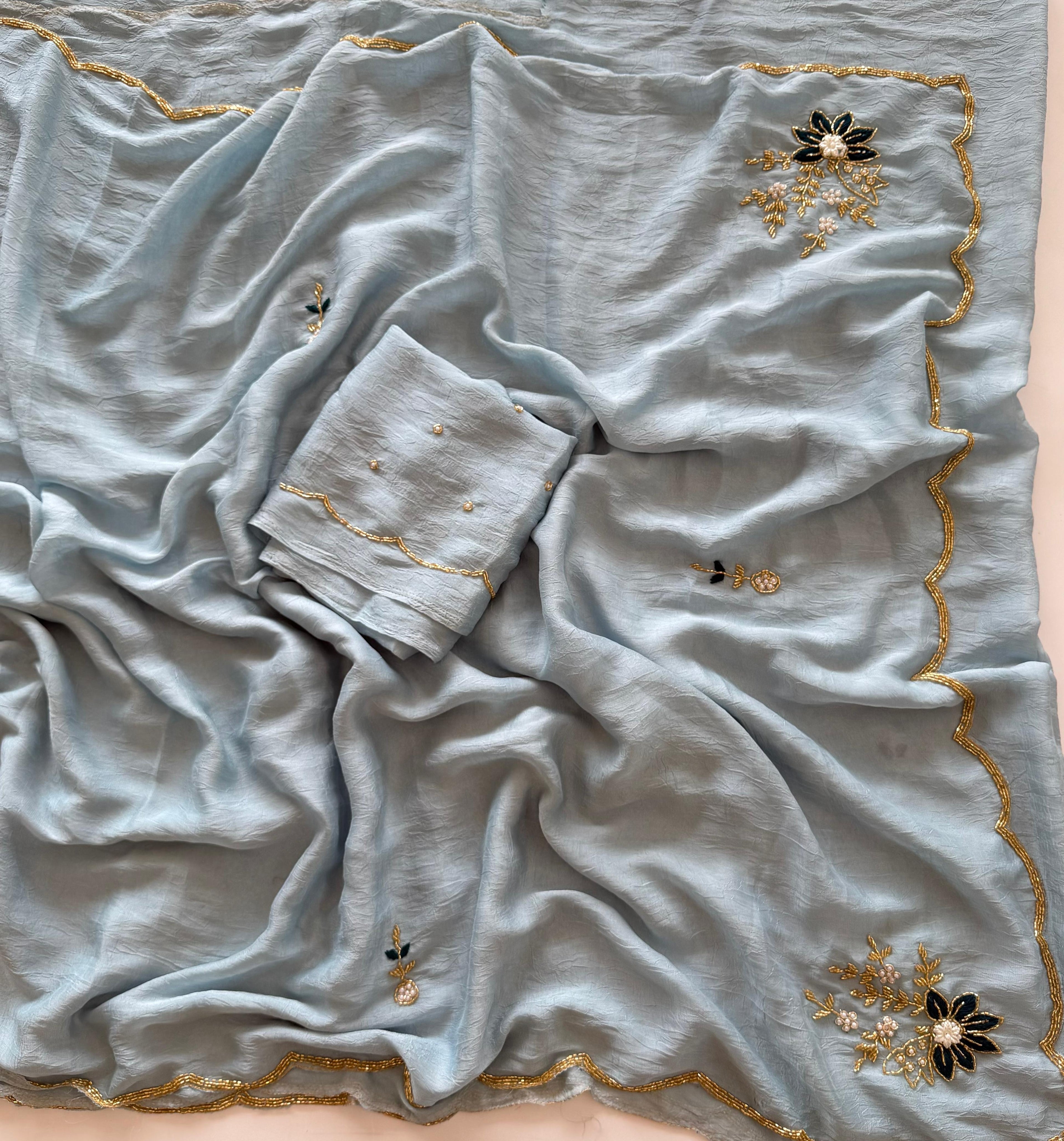 Soft crush rangoli saree with beautiful handwork all over and running blouse with handwork(NON-STORE)