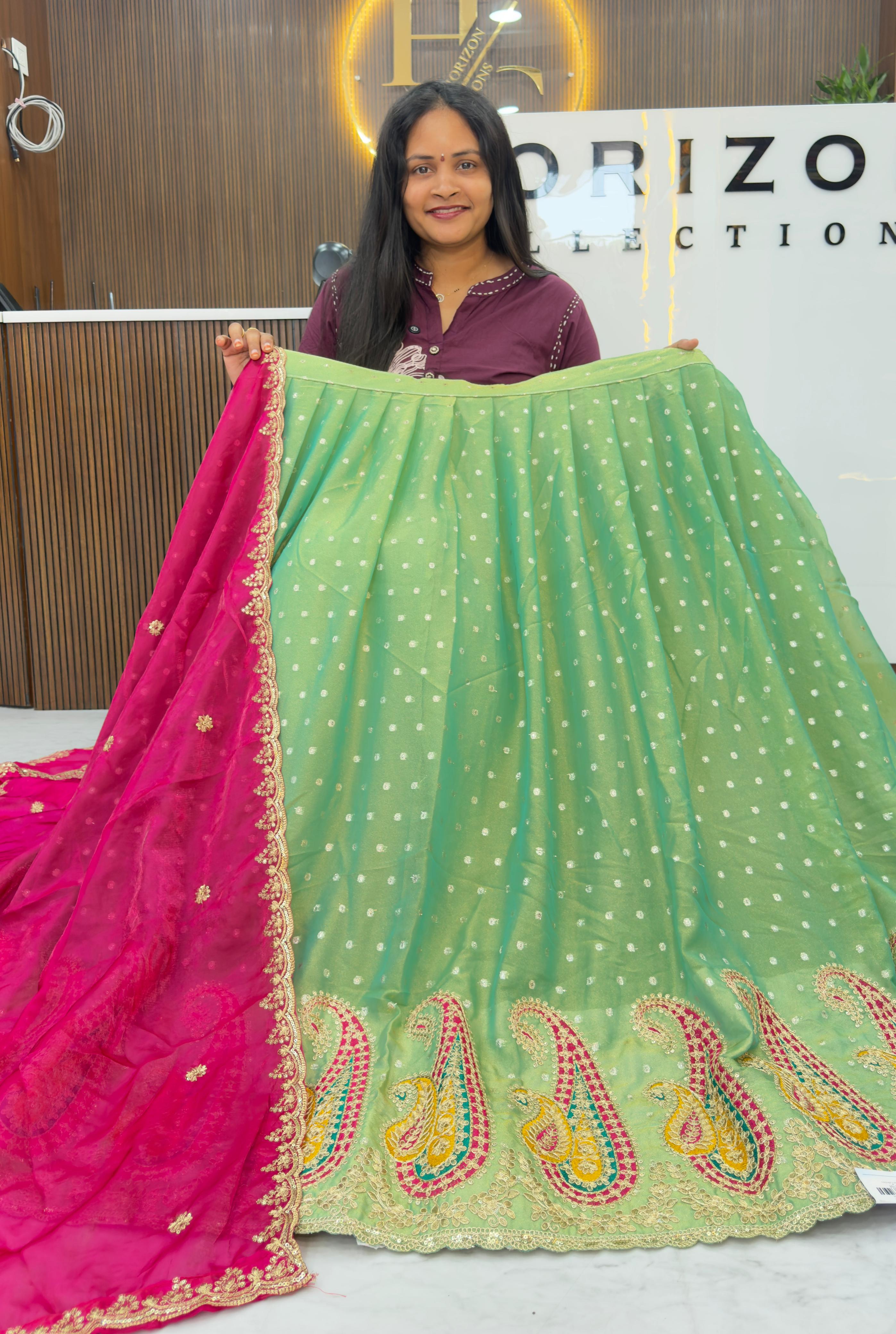 Shimmer tissue party wear lehengas