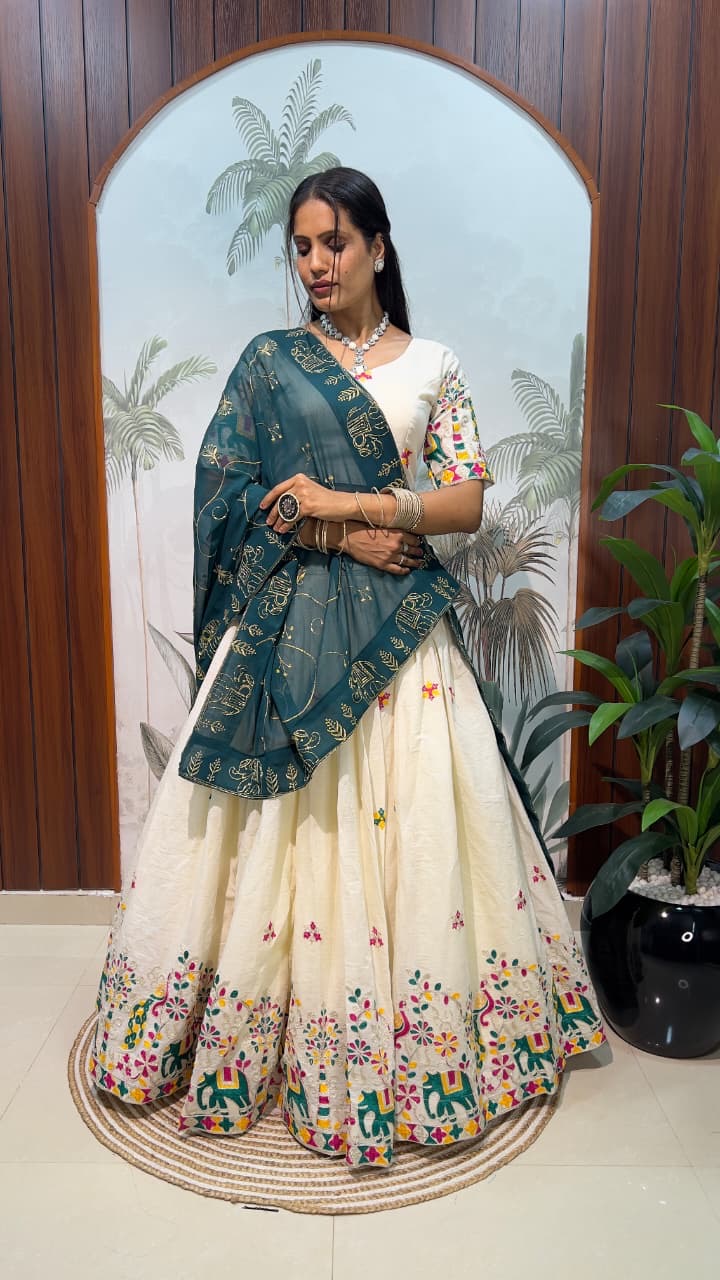 White lehenga with multi color thread work