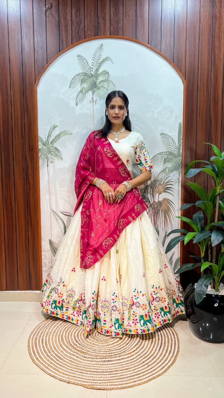 White lehenga with multi color thread work
