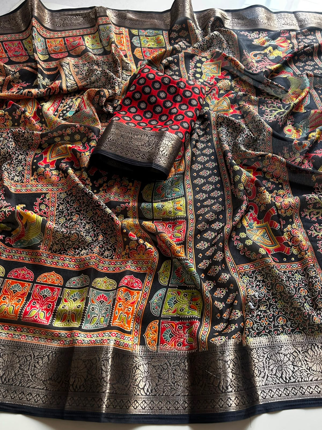 Dola silk saree with Kalamkari print and jacquard border