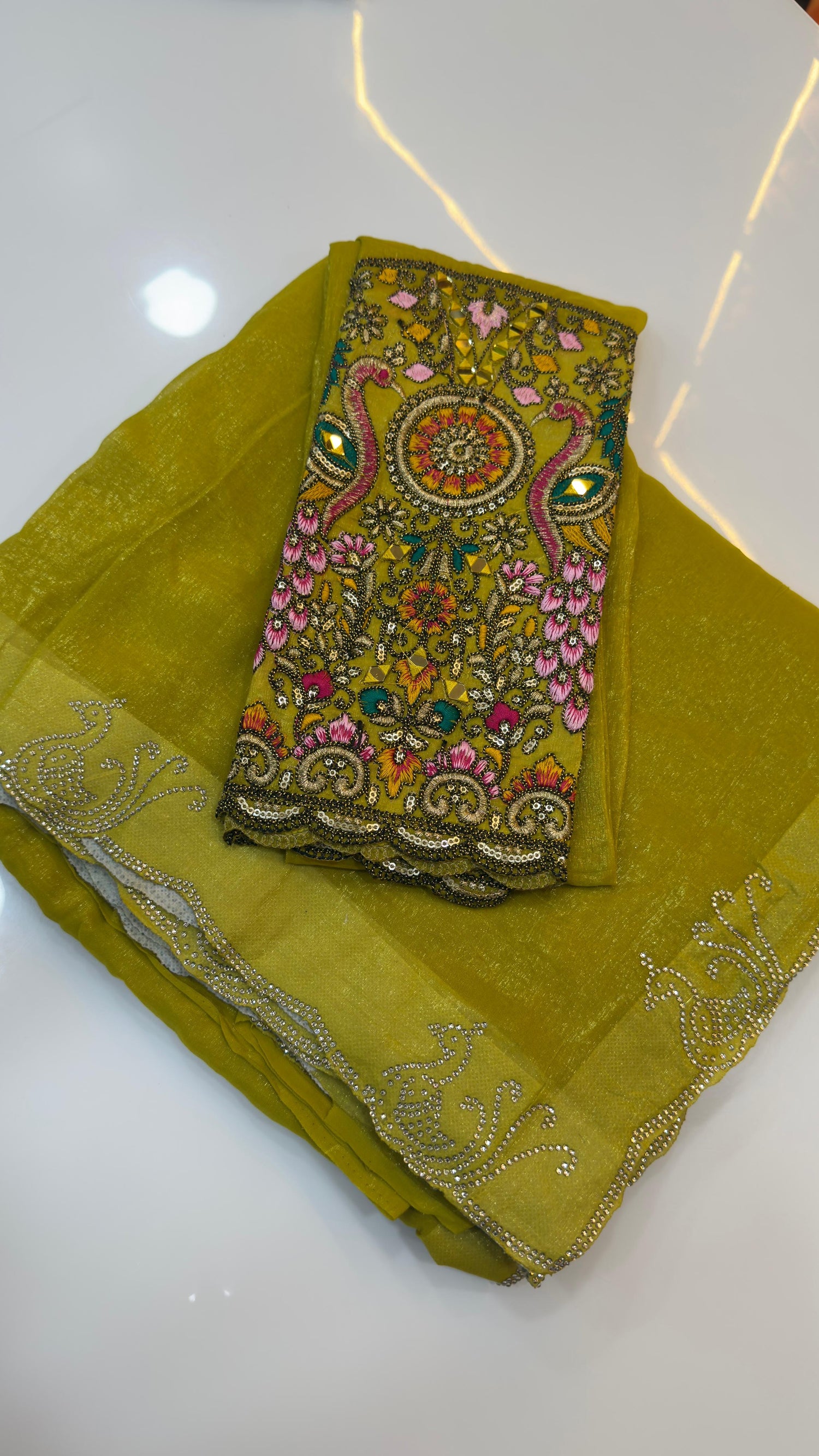 Fendy silk sarees with peacock design swaroshki stones across the border