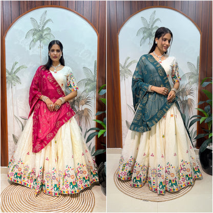 White lehenga with multi color thread work