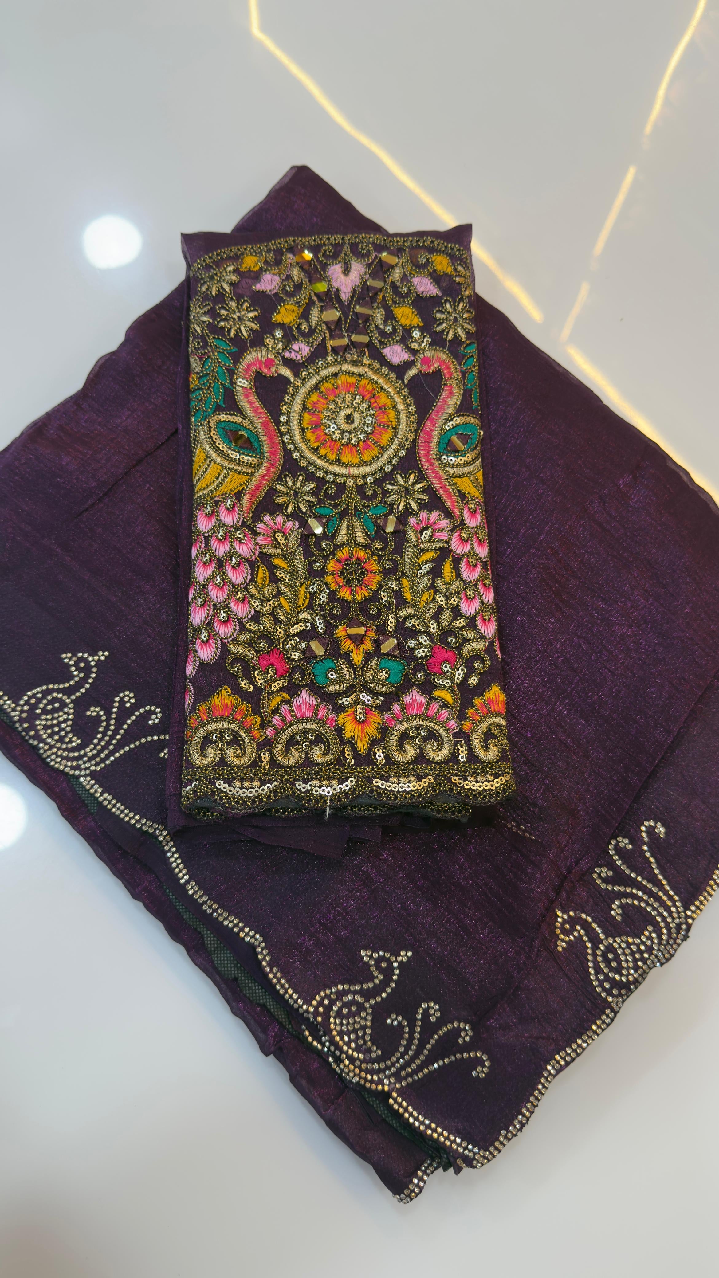 Fendy silk sarees with peacock design swaroshki stones across the border