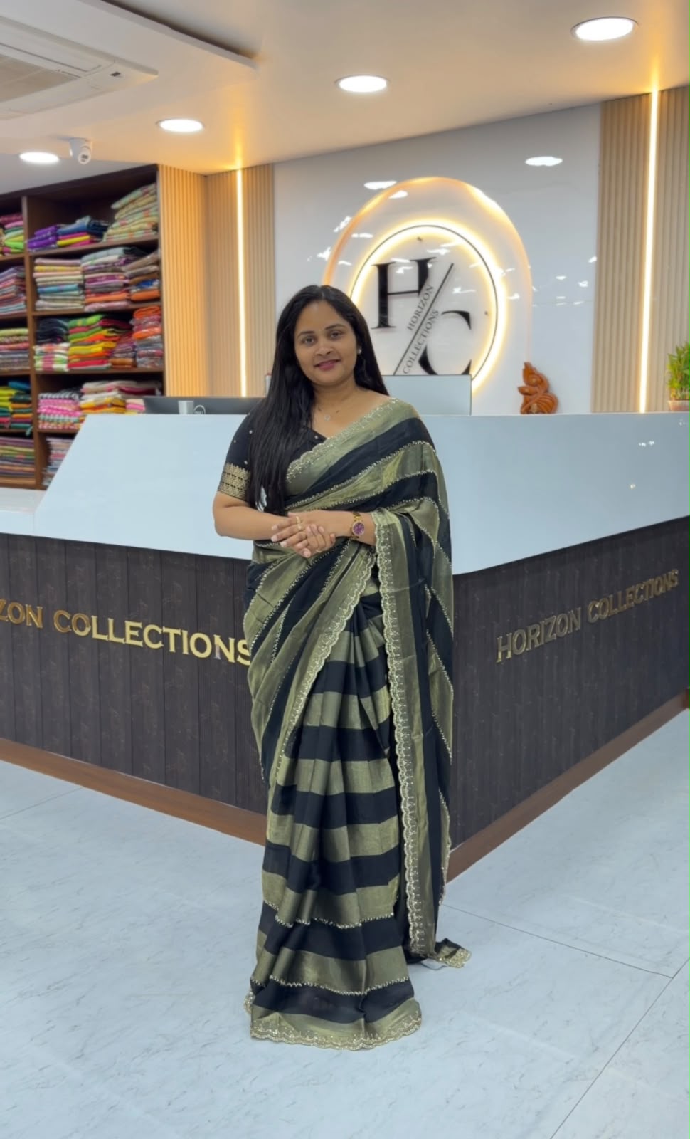 Party wear sarees with swaroshki stones