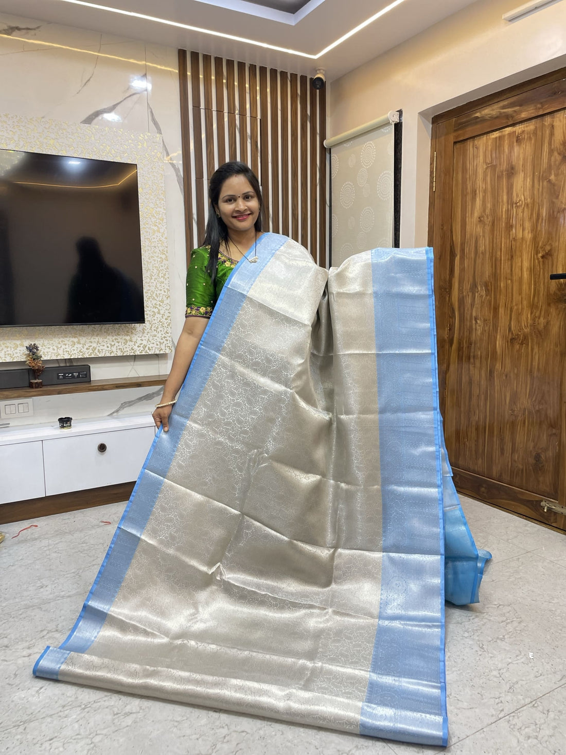 Silver saree with Blue borders