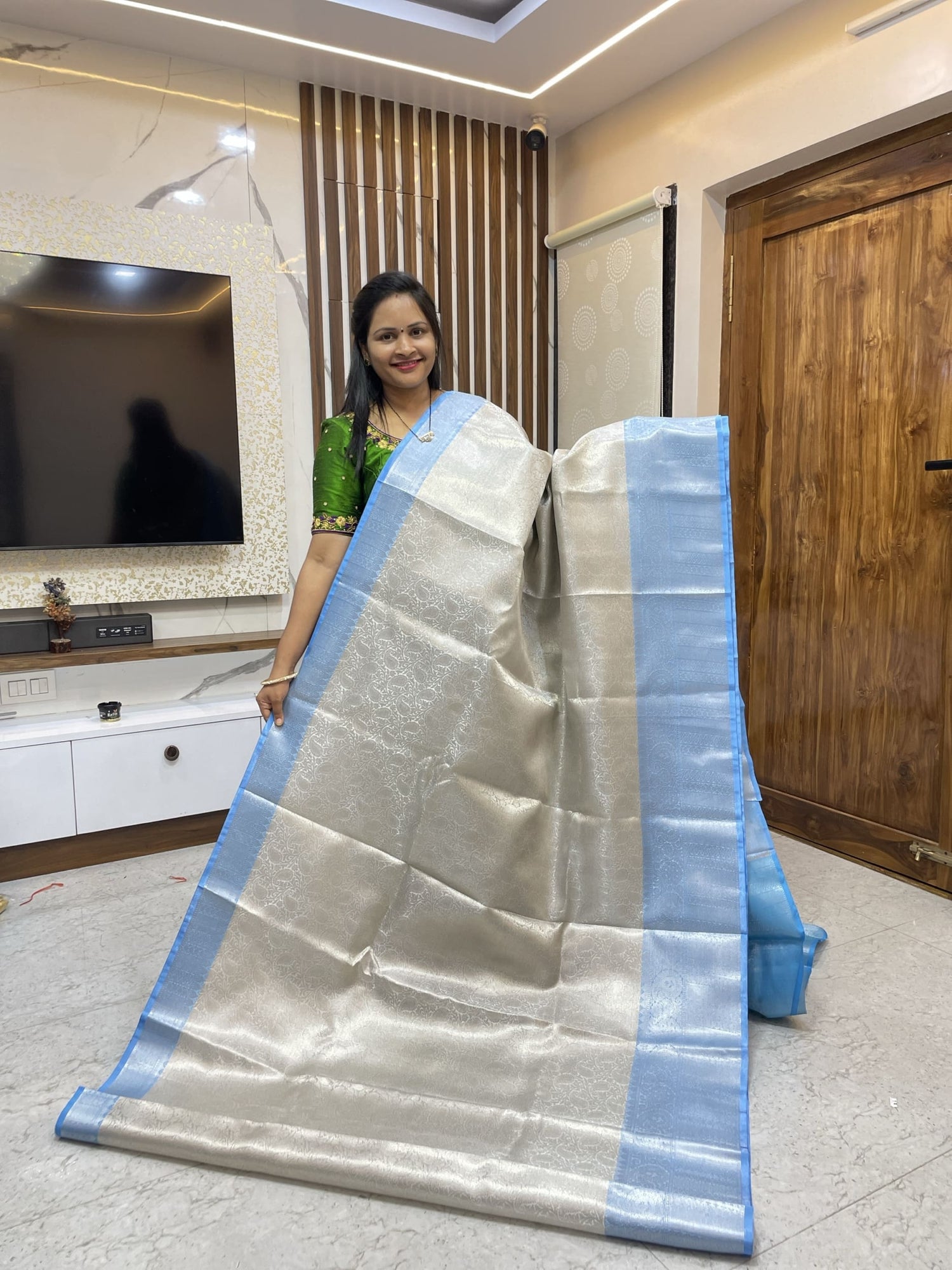Silver saree with Blue borders